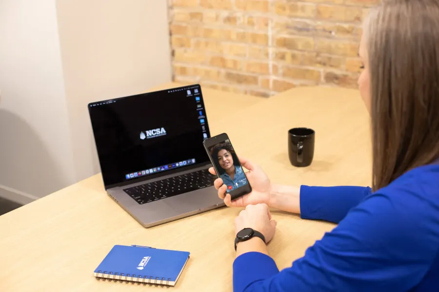 Athlete using IMG Academy digital training platform on tablet